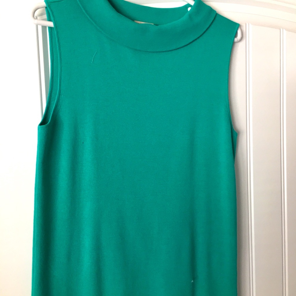Long green sleeveless knit top